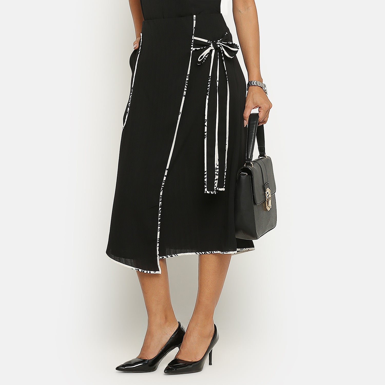 Black Asymmetrical Skirt With Contrast Piping, frocks for women
indian designer skirts?