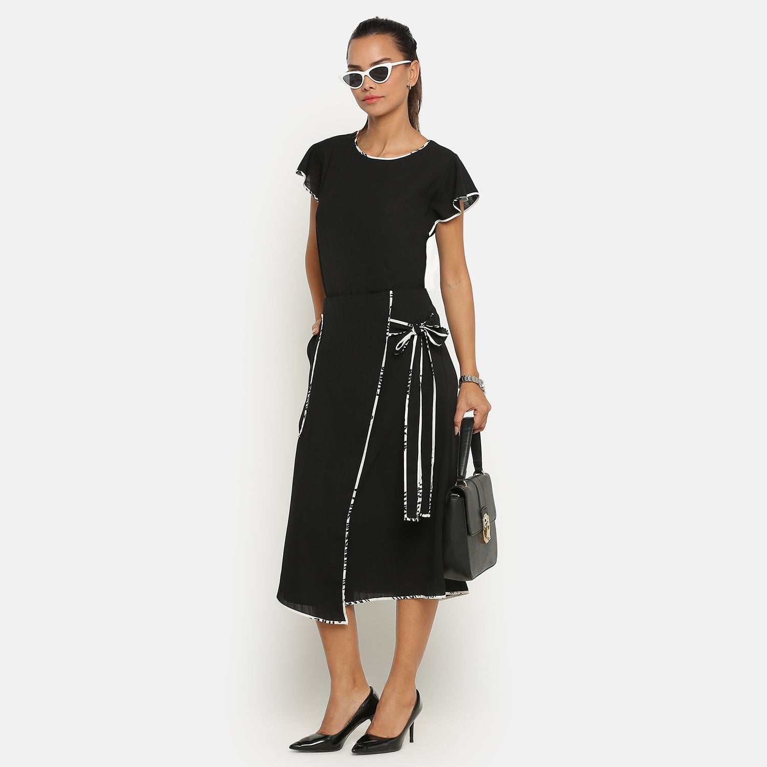 Black Asymmetrical Skirt With Contrast Piping, frocks for women
indian designer skirts?