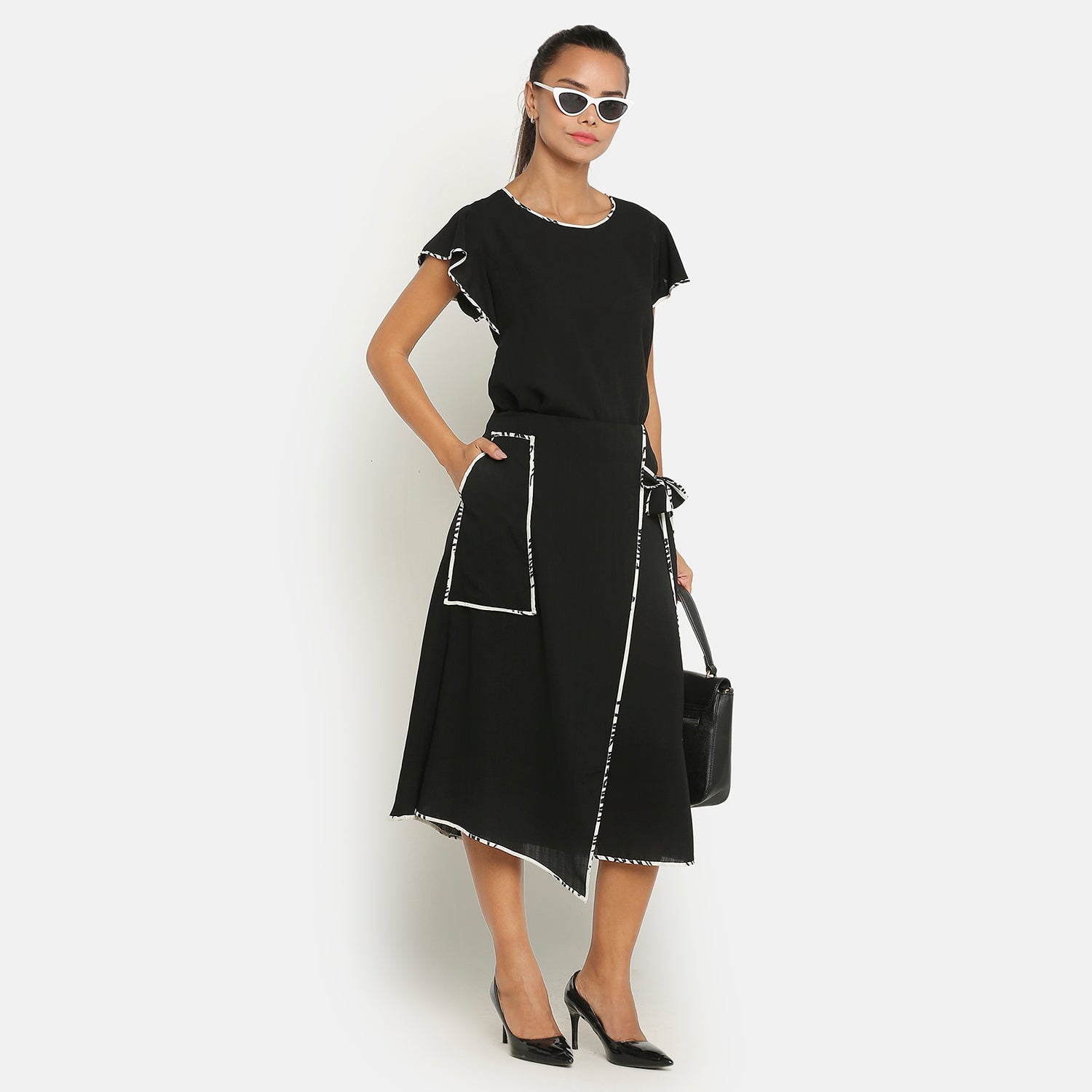 Black Top With Frill on Side Seam With Contrast Pining, formal tops for women
tops for women stylish
office dress for women
stylish tops for women