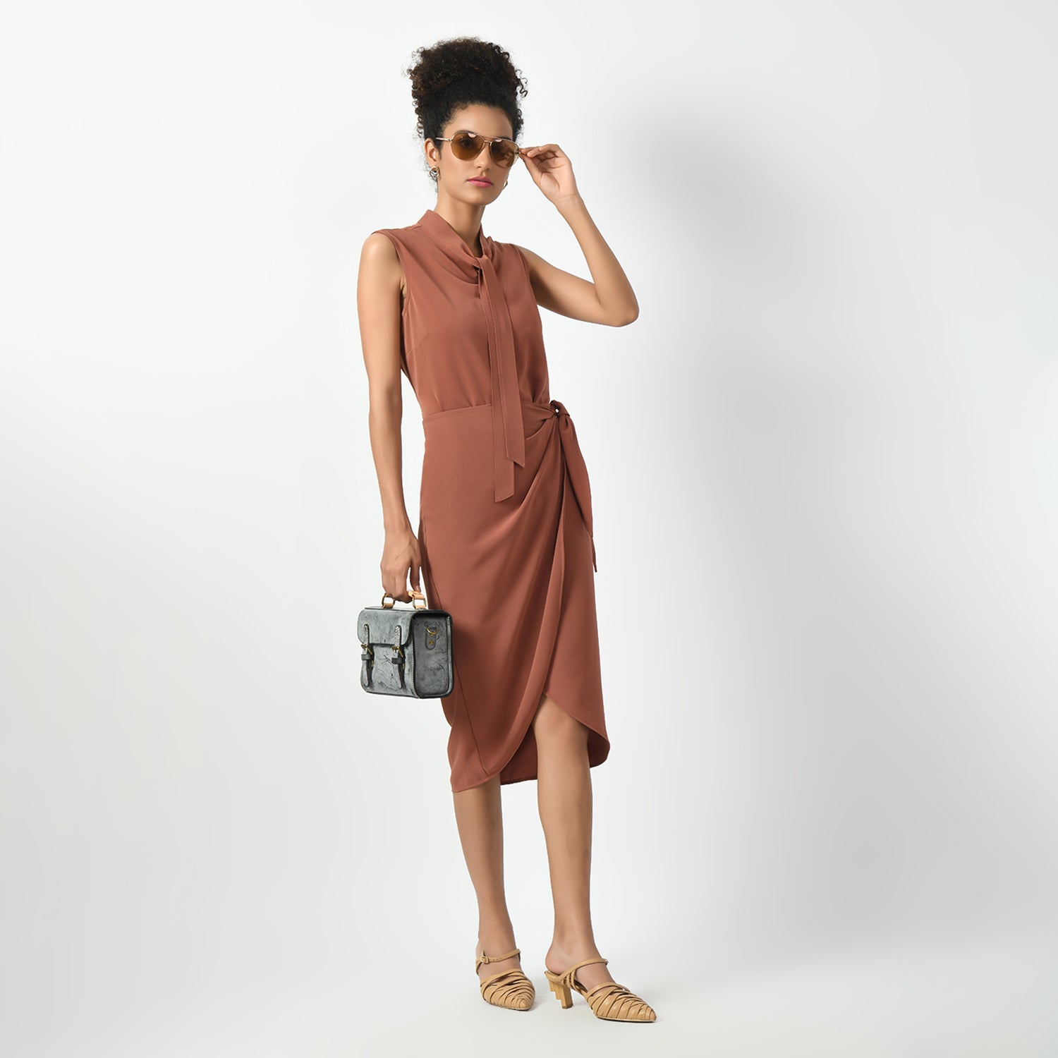 Peach Sleeveless Top With Knot, sleveeless tops for women, top with knot, peach colour tops, office wear tops, stylish formal tops, best tops for work, elegant worktops, trendy tops for women , modern tops for office, formal tops for women, tops for women stylish