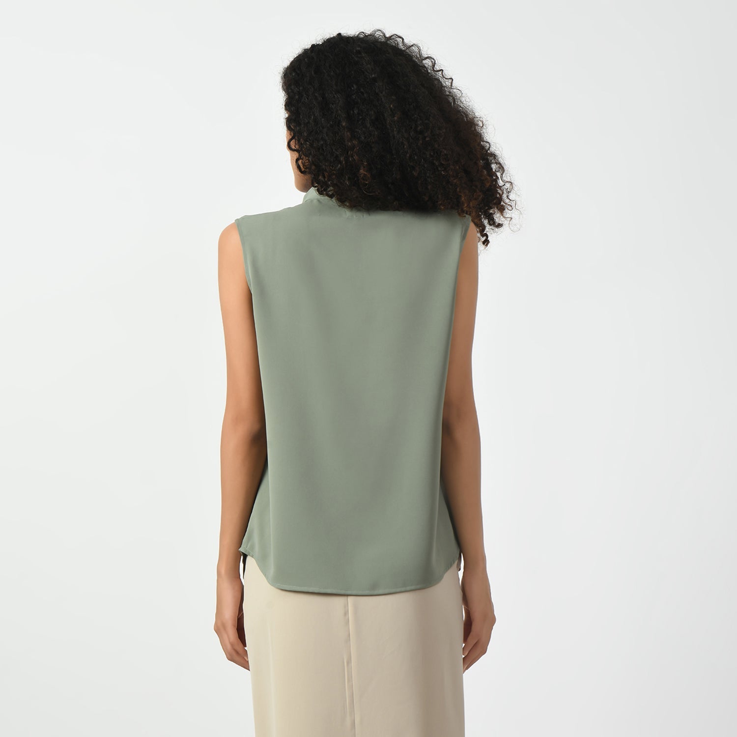 Dusty Green Sleeveless Top With Knot, sleeveless top, top with the knot, green tops for women, tops with knots for women, office wear tops , stylish formal tops , best tops for work, stylish work tops , trendy tops for women ,modern tops for office, formal tops for women, tops for women stylish
